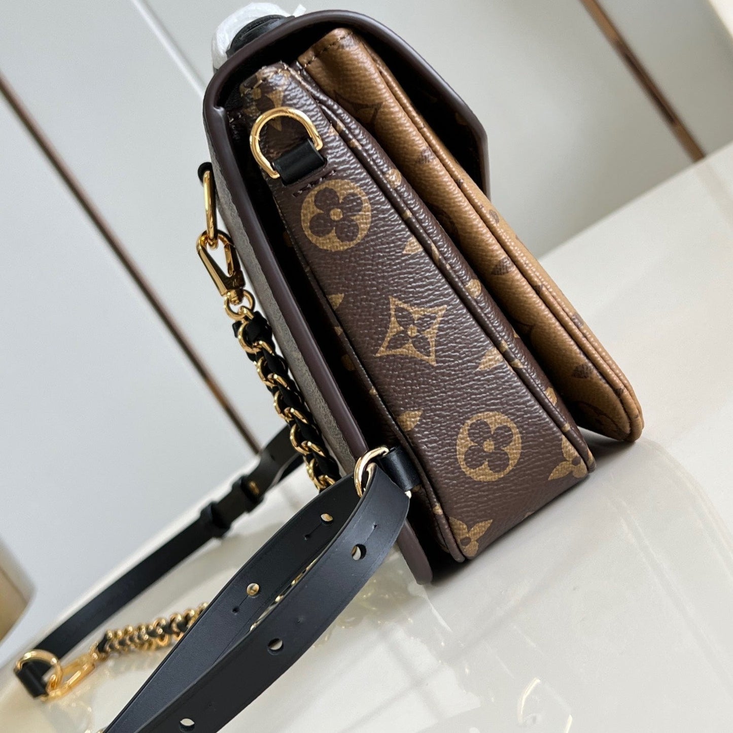 POCHETTE MÉTIS 20 IN BROWN MONOGRAM AND MONOGRAM REVERSE CANVAS GOLD BUCKLE