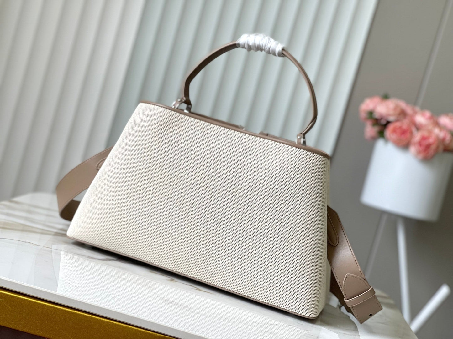 CAPUCINES SOUPLE GM 38 IN WHITE CANVAS AND TAUPE CALFSKIN TRIM