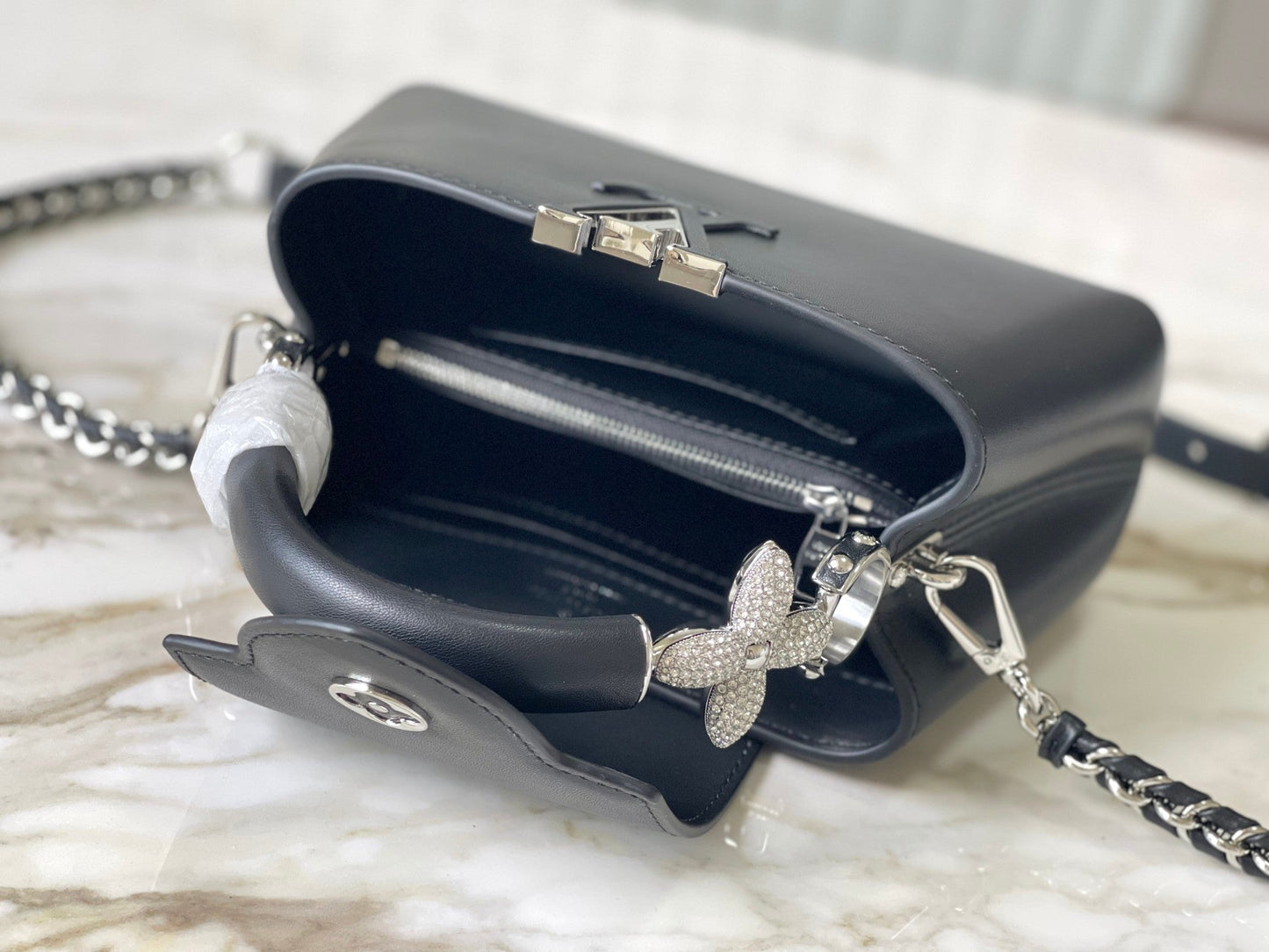 CAPUCINES EAST-WEST MINI 22 IN BLACK SHEEPSKIN CRYSTAL AND SILVER HARDWARE