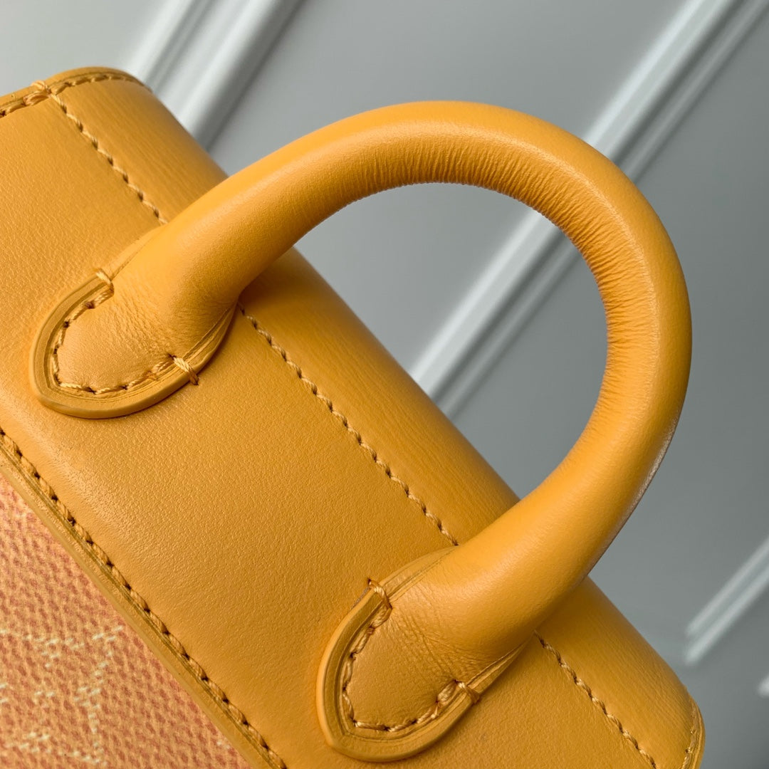 STEAMER 18 IN PEPPER ORANGE MONOGRAM HERITAGE CANVAS GOLD HARDWARE