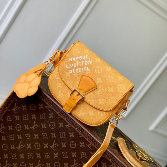 MONTSOURIS MESSENGER PM 20 IN PEPPER ORANGE MONOGRAM HERITAGE CANVAS