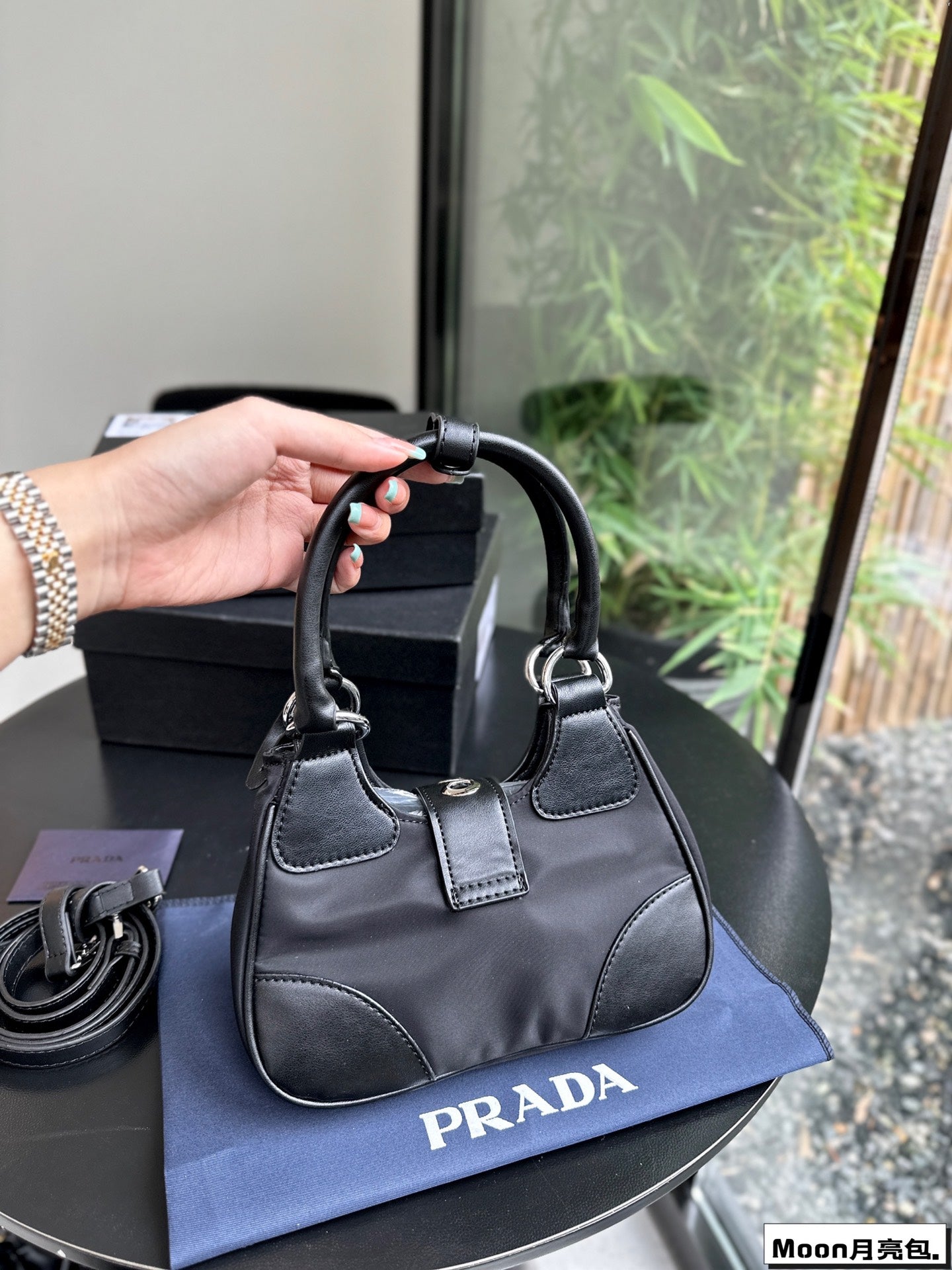 PRA 22 MOON PADDED BAG IN BLACK CALFSKIN WITH STRAP