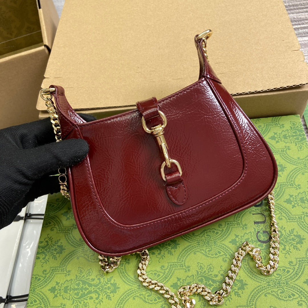 JACKIE NOTTE MINI BAG 19 IN RED WINE CRACKED LACQUER CALFSKIN GOLD HARDWARE