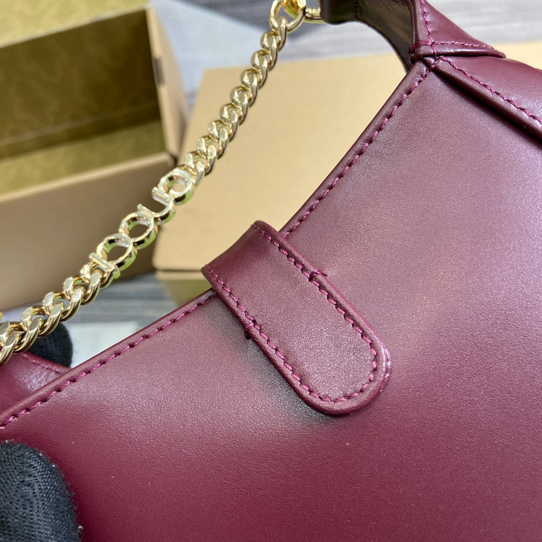 JACKIE NOTTE MINI BAG 19 IN BURGUNDY RED CALFSKIN GOLD HARDWARE