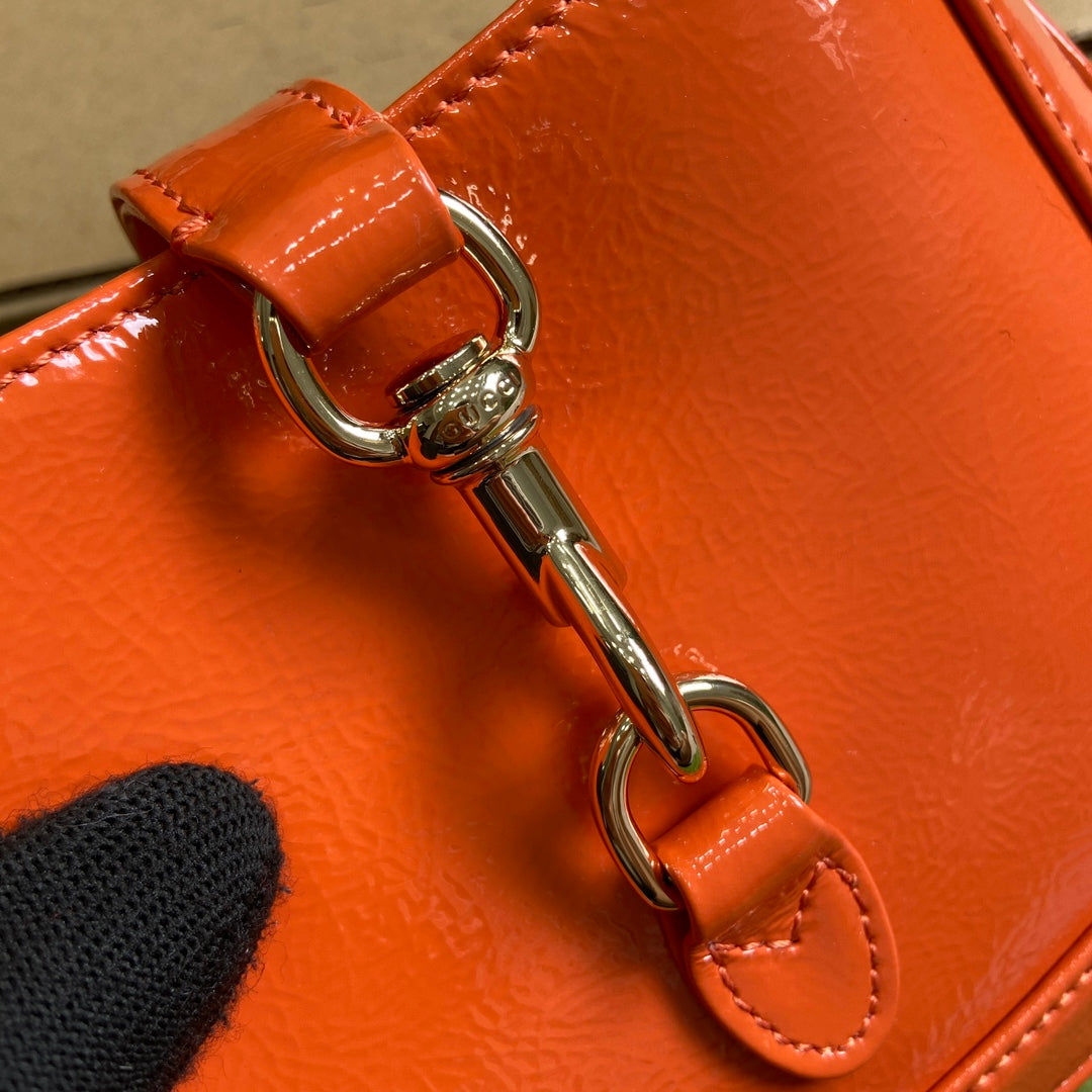 JACKIE NOTTE MINI BAG 19 IN ORANGE CRACKED LACQUER CALFSKIN GOLD HARDWARE