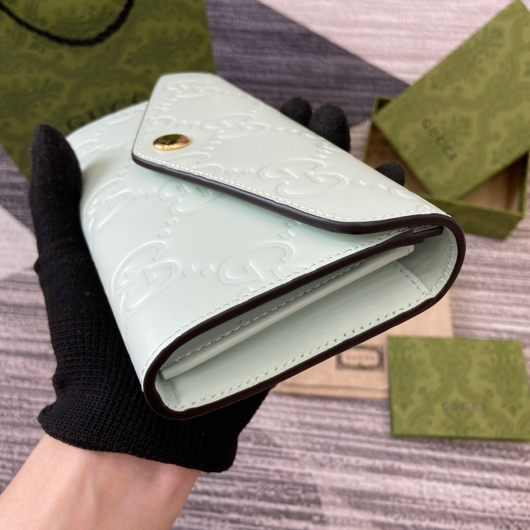 CONTINENTAL WALLET 19 IN MINT GREEN EMBOSSED CALFSKIN GOLD HARDWARE