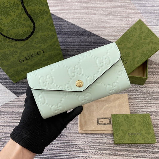 CONTINENTAL WALLET 19 IN MINT GREEN EMBOSSED CALFSKIN GOLD HARDWARE