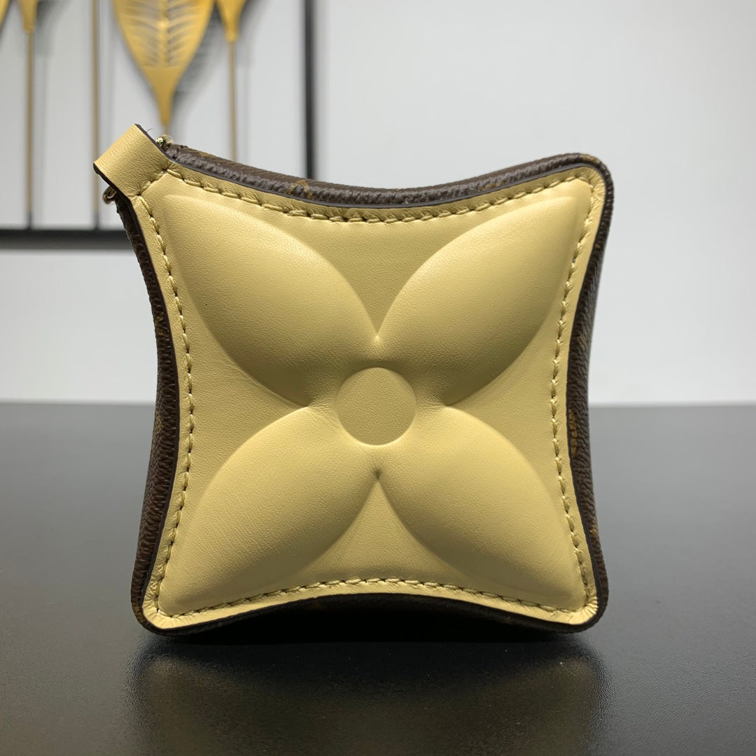 BLOOM POUCH 22 IN BROWN MONOGRAM CANVAS AND PASTEL YELLOW CALFSKIN SIDES