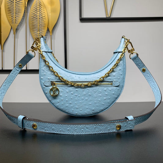 LOOP 23 IN POWER BLUE OSTRICH LEATHER GOLD HARDWARE