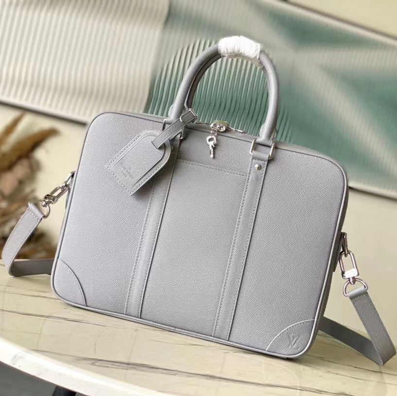 PORTE-DOCUMENTS VOYAGE PM 36 IN DOVE GRAY CALFSKIN