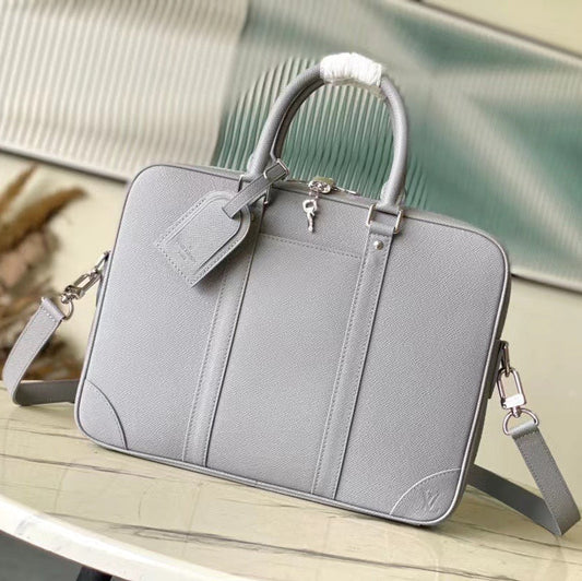 PORTE-DOCUMENTS VOYAGE PM 36 IN DOVE GRAY CALFSKIN