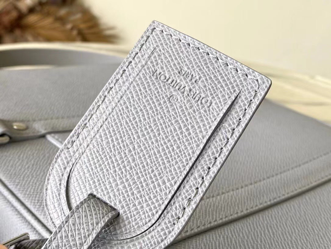 PORTE-DOCUMENTS VOYAGE PM 36 IN DOVE GRAY CALFSKIN