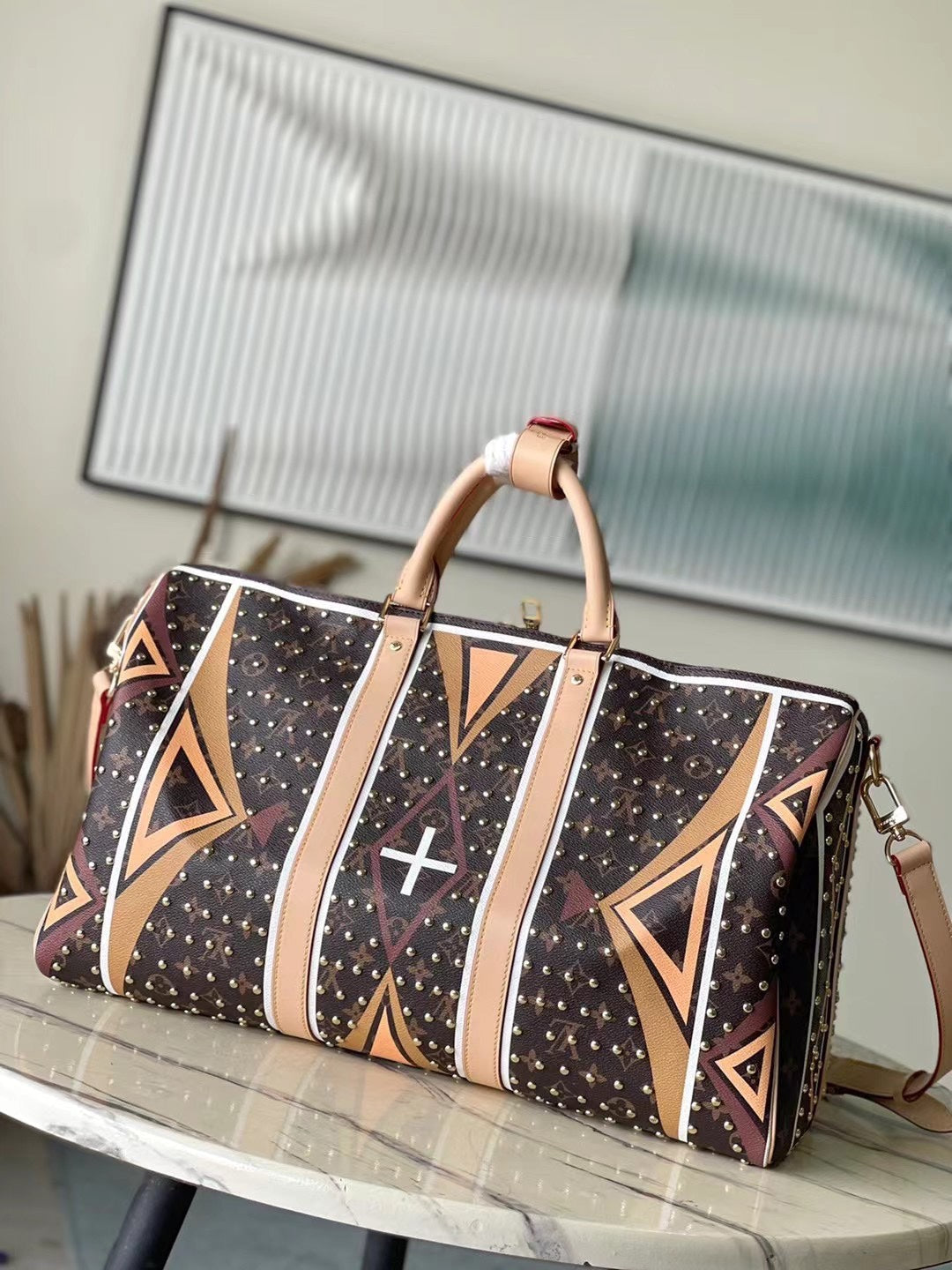 KEEPALL BANDOULIÈRE 50 IN PARFLECHE PATTERN MONOGRAM CANVAS