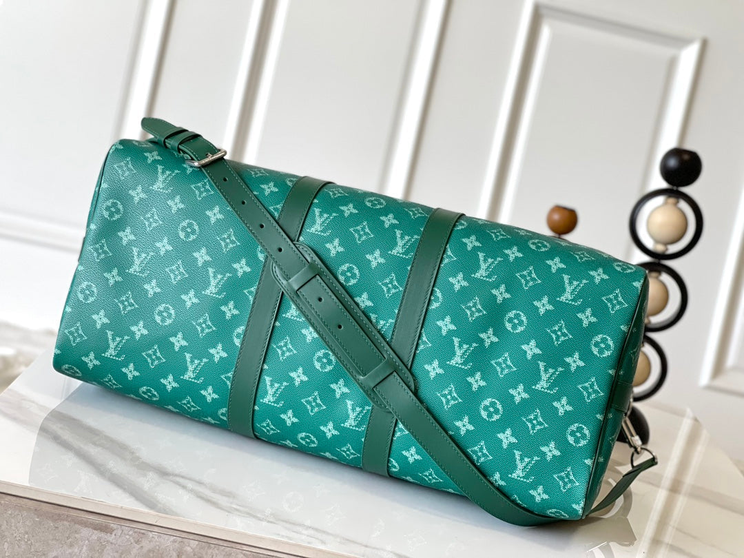 KEEPALL BANDOULIÈRE 50 IN GREEN MONOGRAM HERITAGE CANVAS