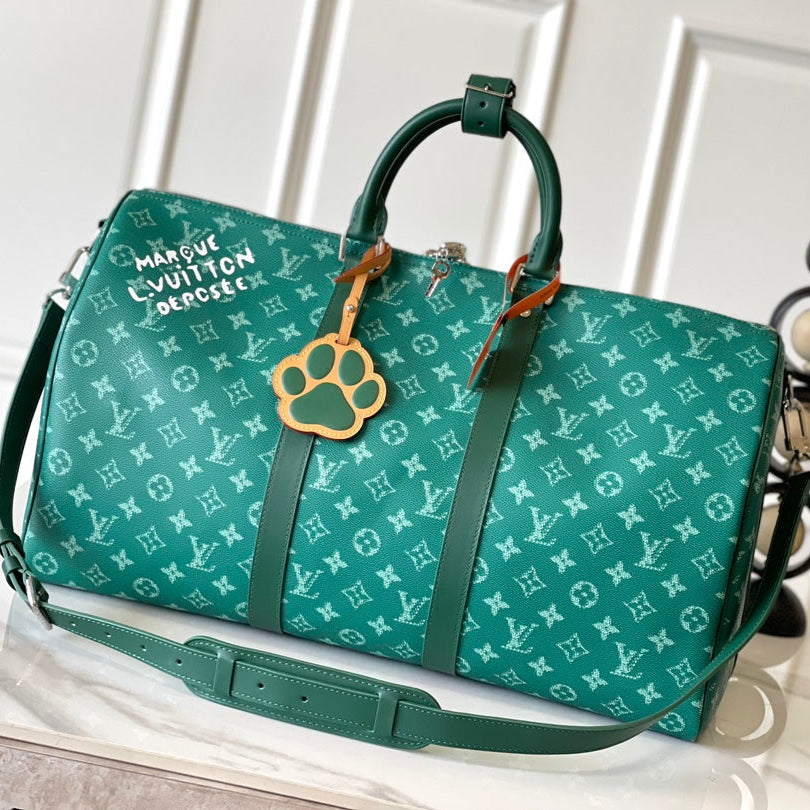 KEEPALL BANDOULIÈRE 50 IN GREEN MONOGRAM HERITAGE CANVAS