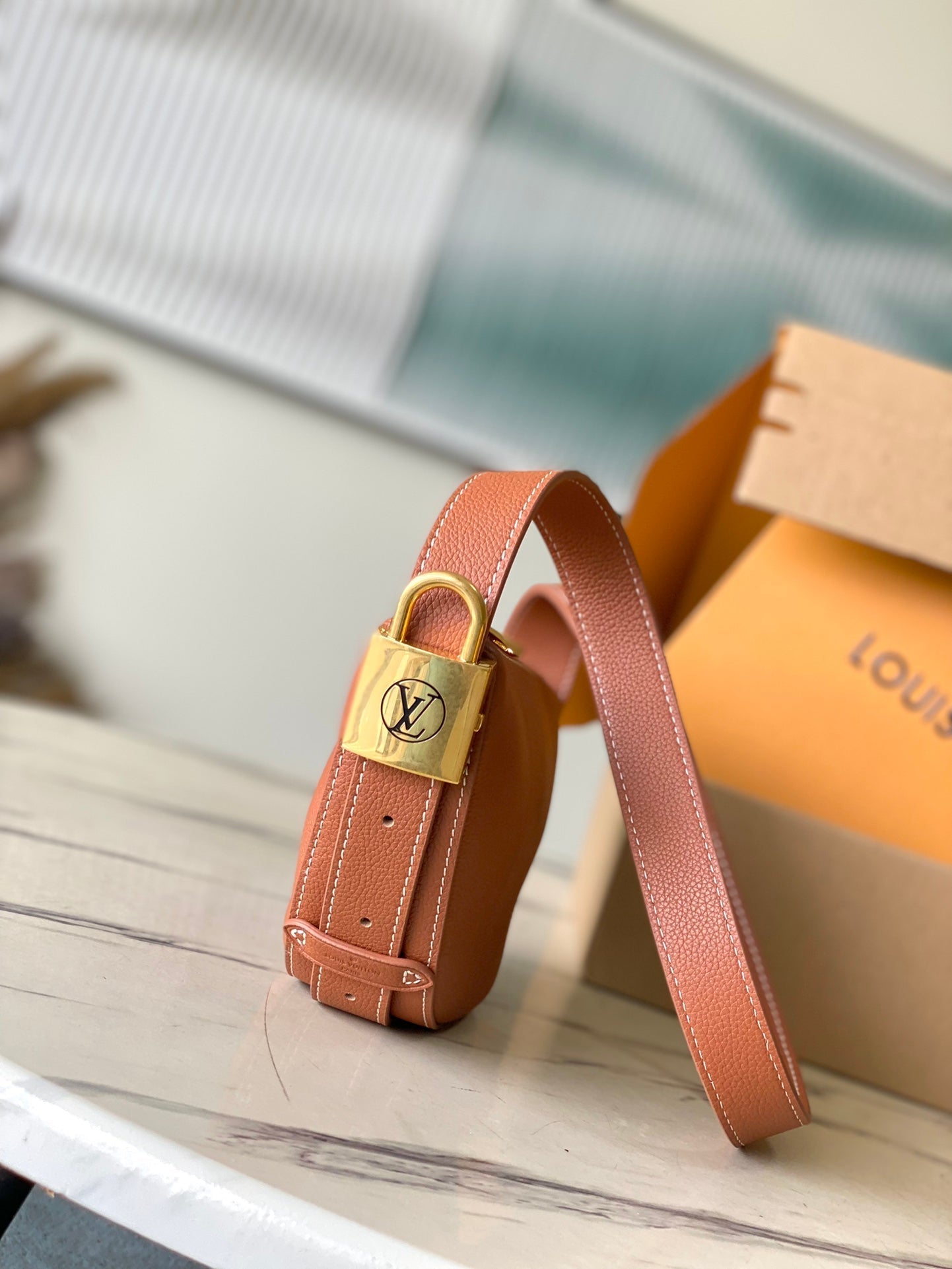 LOW KEY BUMBAG 28 IN SPANISH ORANGE CALFSKIN GOLD BUCKLE