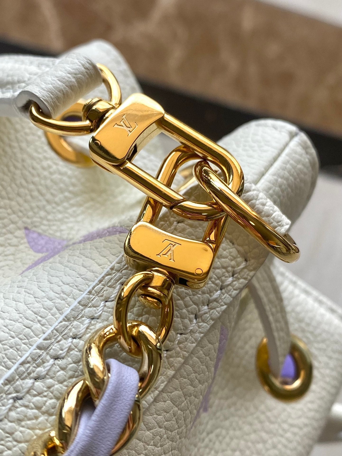 NANO NOÉ 16 IN WHITE PURPLE MONOGRAM EMBOSSED CALFSKIN