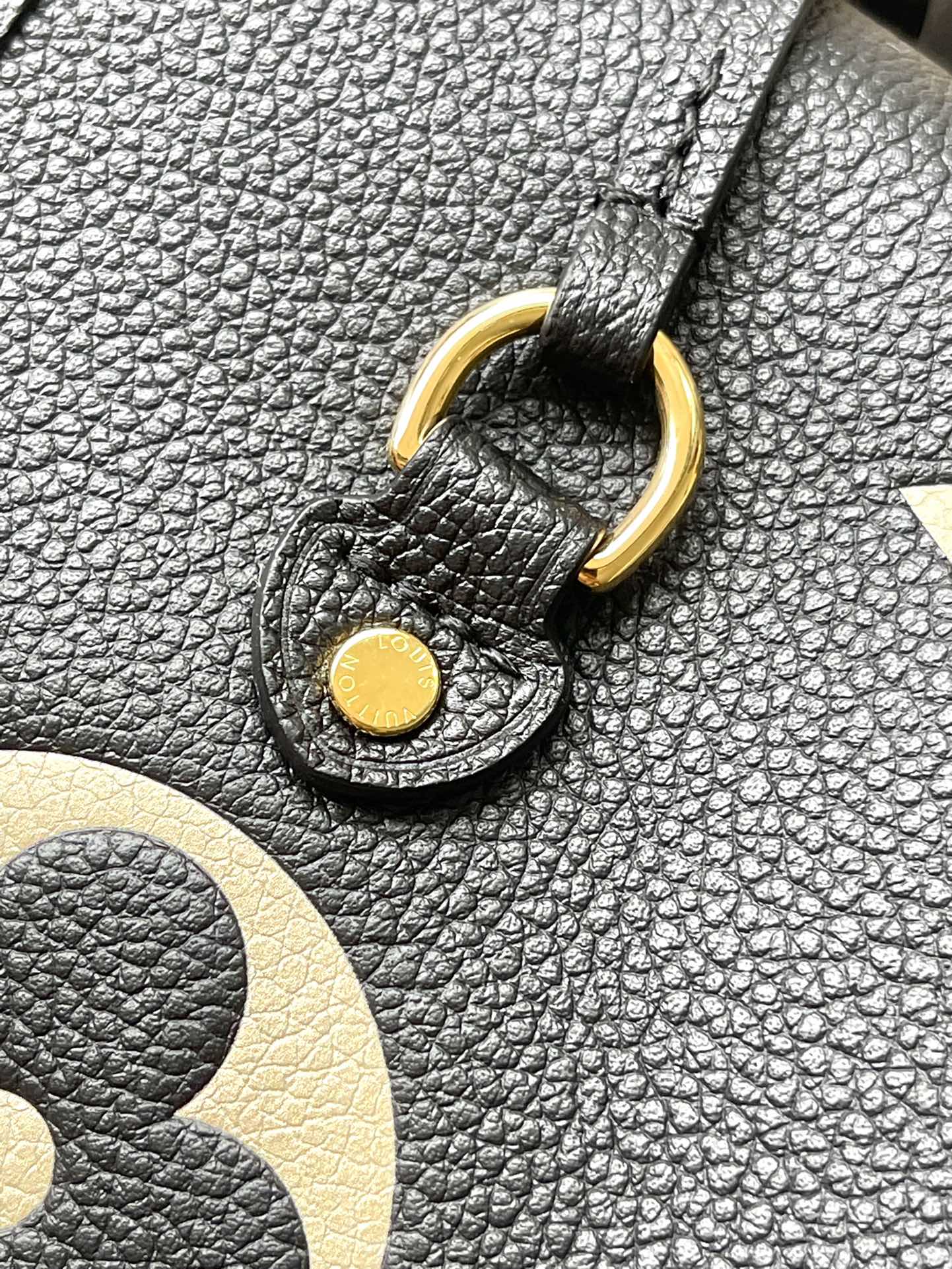 NEVERFULL MM 31 IN BLACK CREAM MONOGRAM EMPREINTE LEATHER