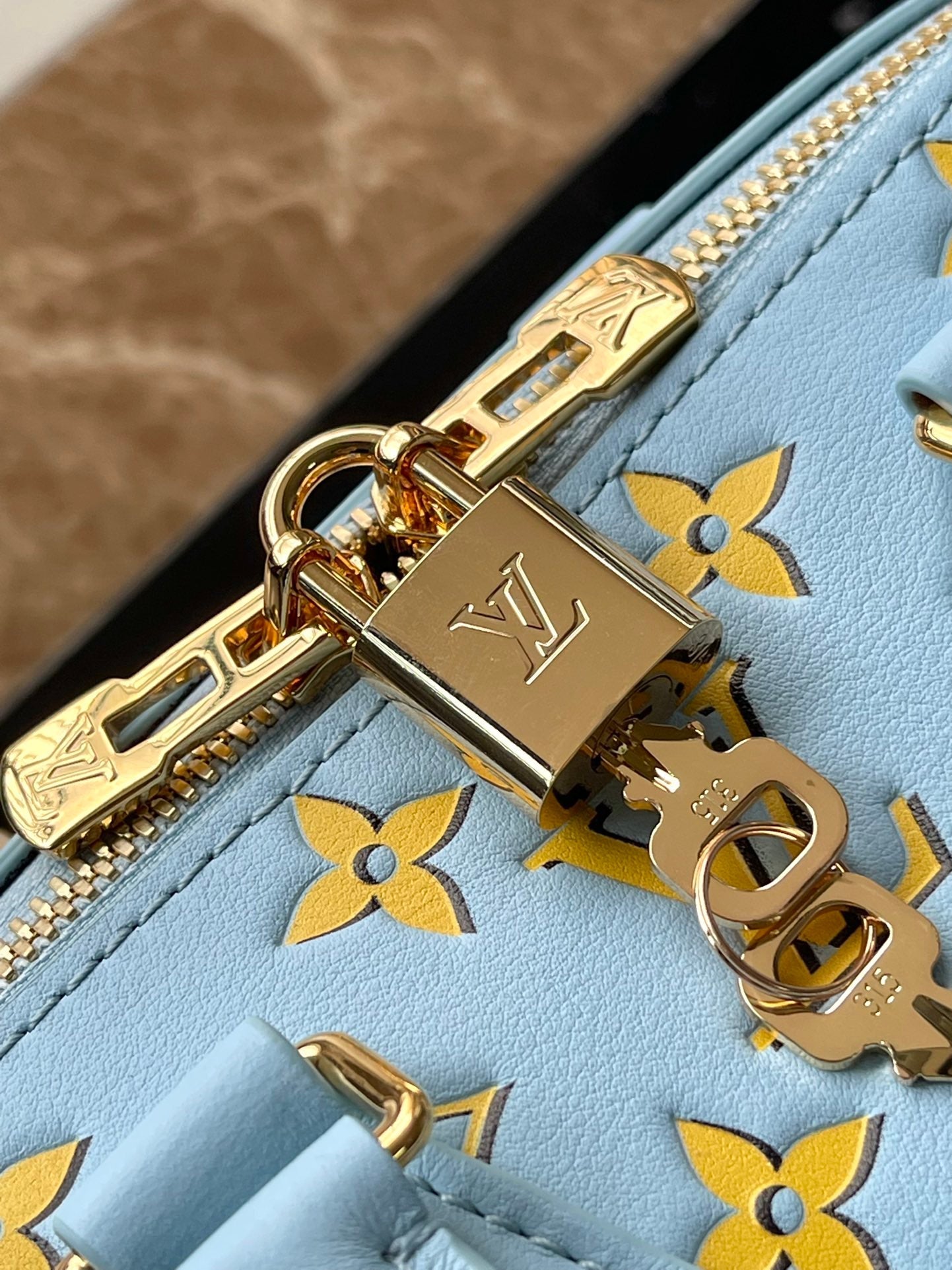 SPEEDY BANDOULIÈRE 20 IN SKY YELLOW MONOGRAM CALFSKIN GOLD BUCKLE