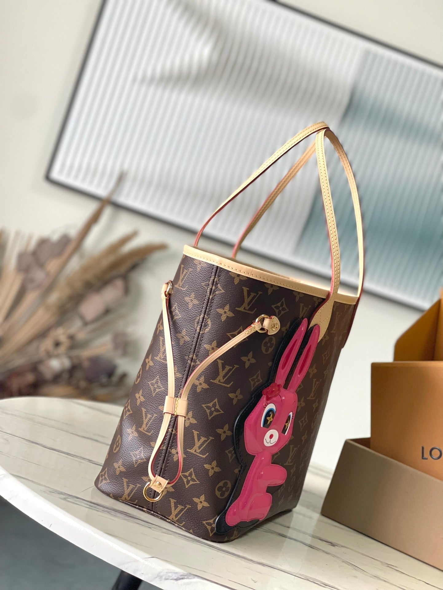 NEVERFULL MM 31 IN BROWN MONOGRAM CANVAS WITH PINK RABBIT PATCH