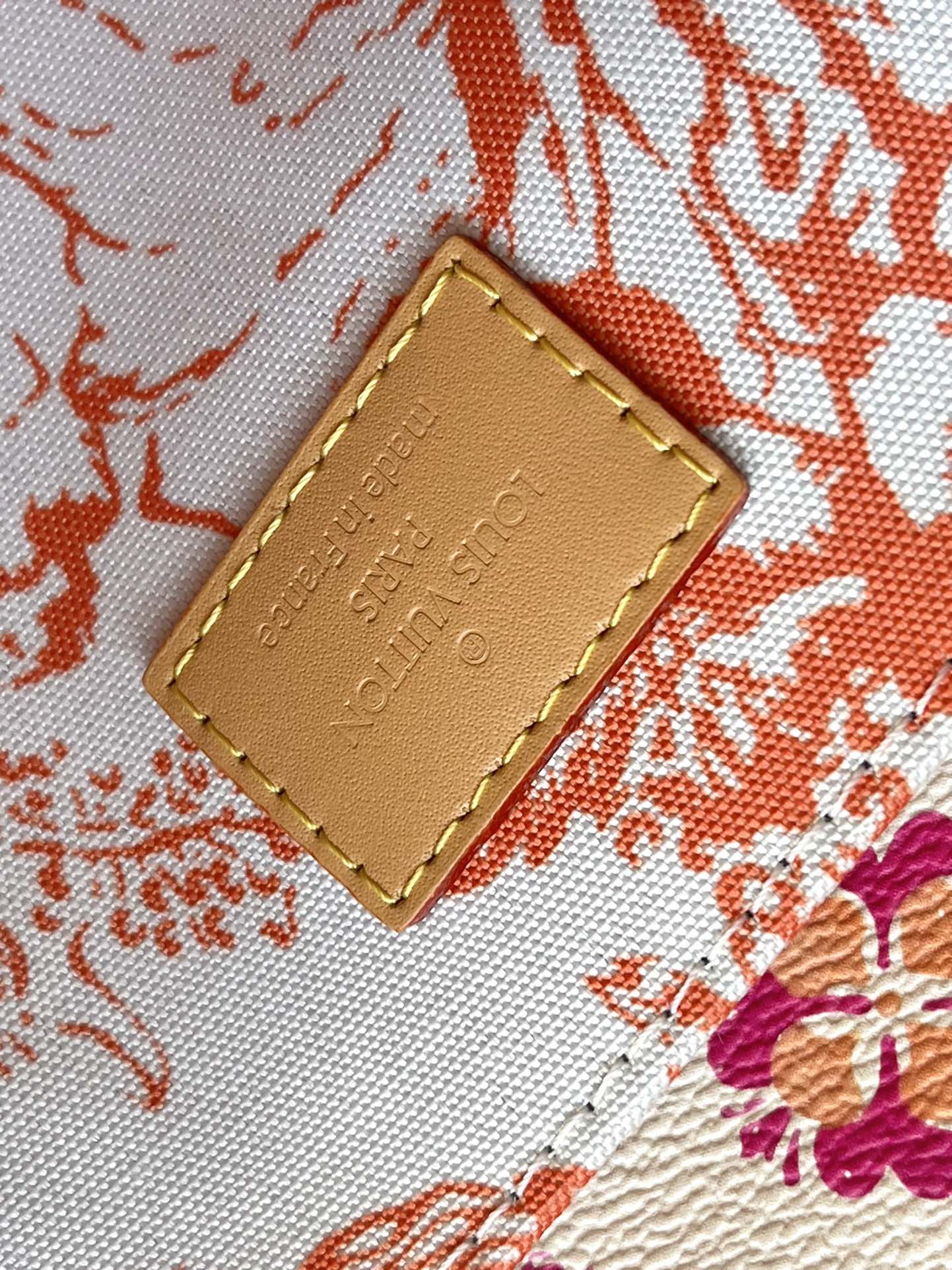 POCHETTE MÉTIS 25 IN CORAL MONOGRAM TILES CANVAS GOLD HARDWARE