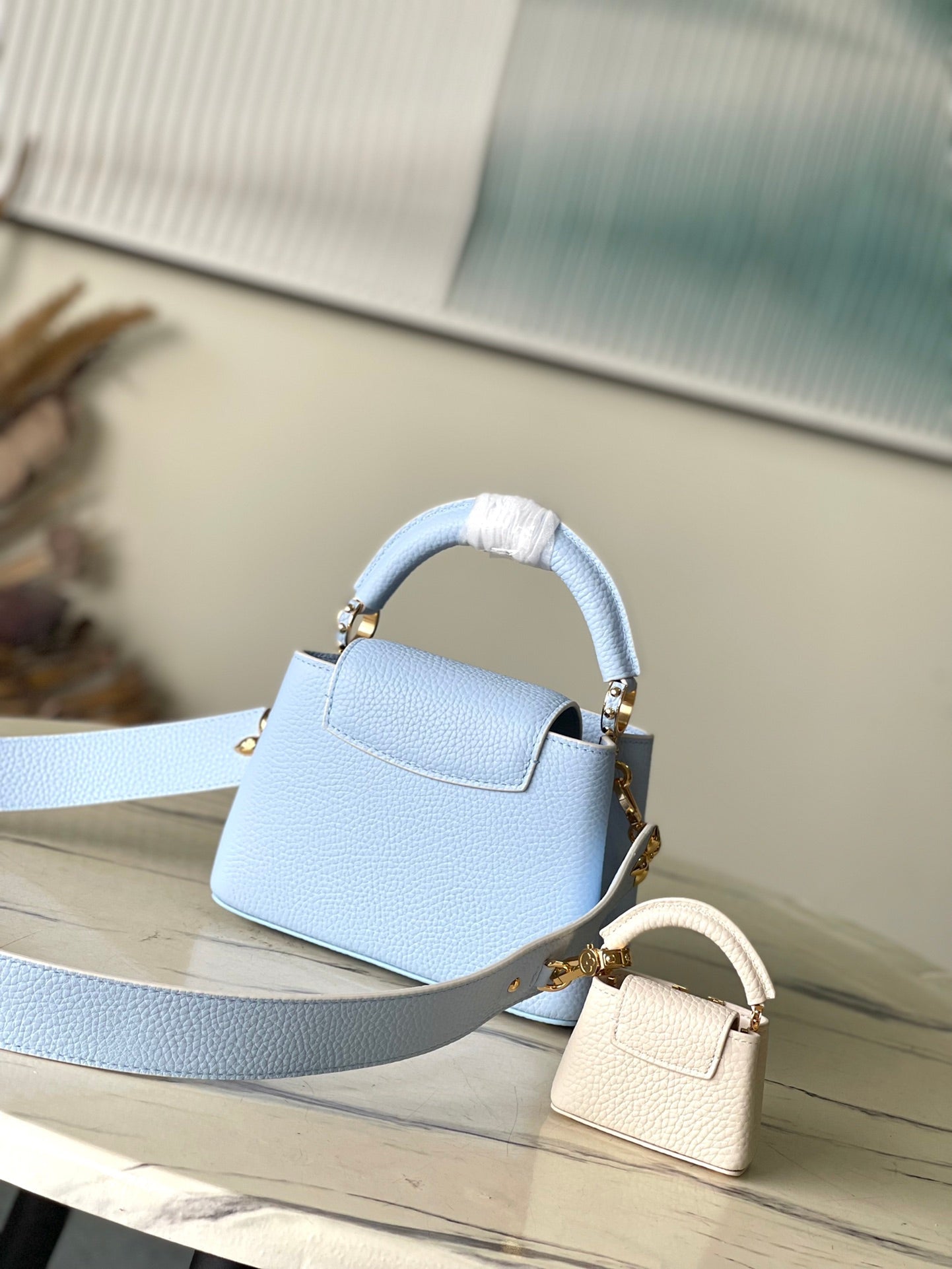 CAPUCINES MINI 21 IN CANDY BLUE TAURILLON GOLD HARDWARE