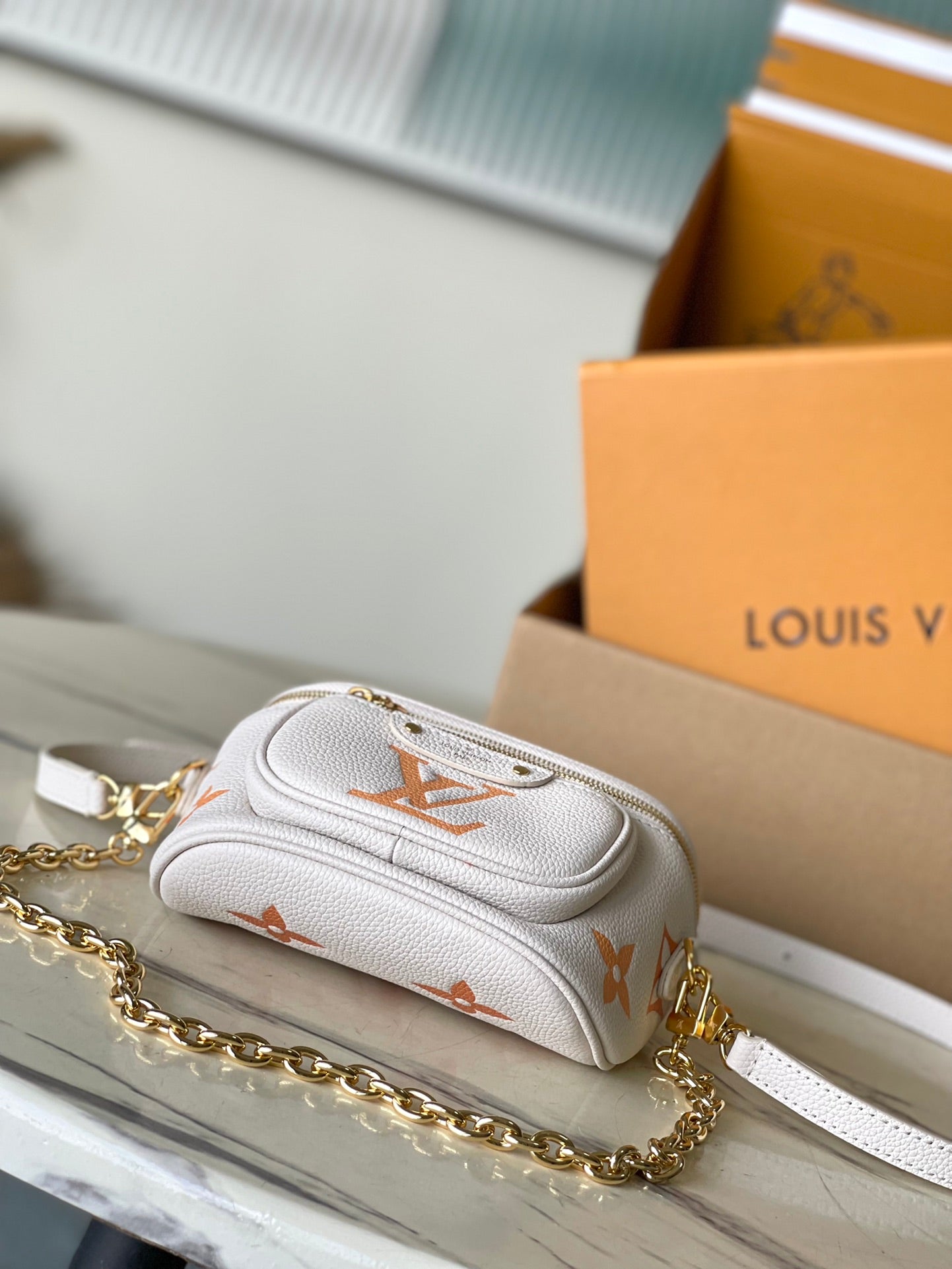 MINI BUMBAG 17 IN WHITE ORANGE MONOGRAM EMPREINTE LEATHER GOLD HARDWARE