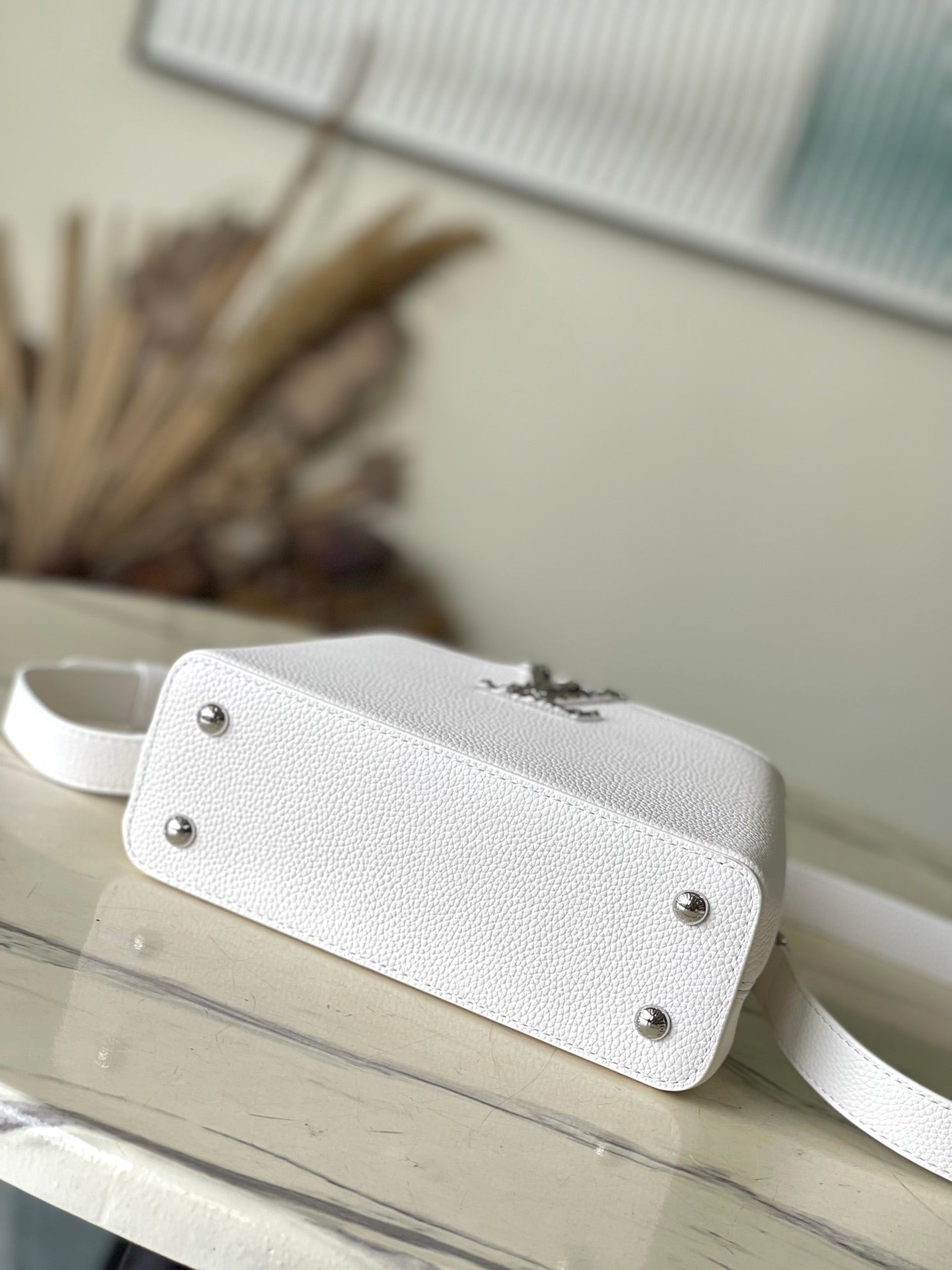 CAPUCINES EAST-WEST MINI 22 IN WHITE CALFSKIN SILVER HARDWARE