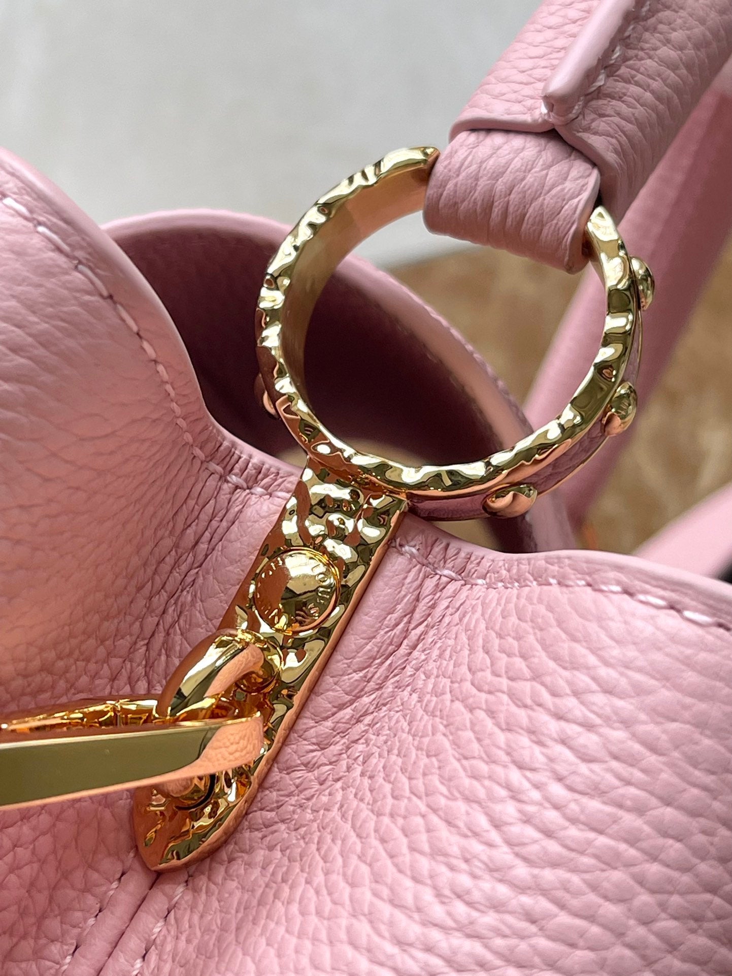 CAPUCINES EAST-WEST 33 IN BLUSH PINK CALFSKIN GOLD HARDWARE