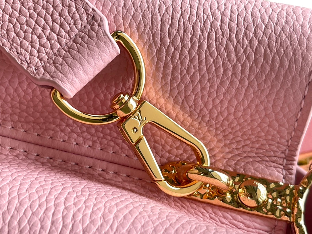 CAPUCINES EAST-WEST 33 IN BLUSH PINK CALFSKIN GOLD HARDWARE