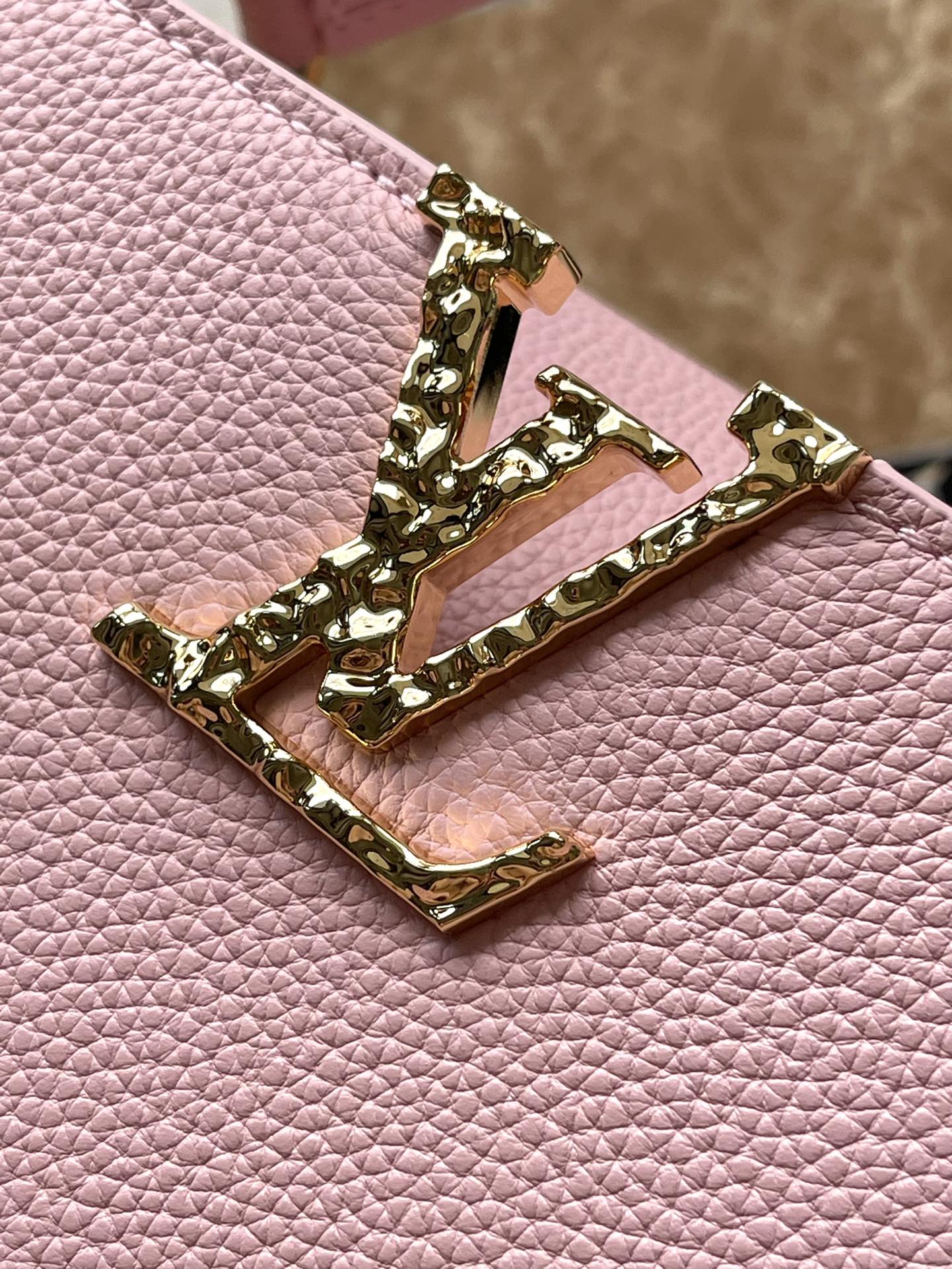 CAPUCINES EAST-WEST 33 IN BLUSH PINK CALFSKIN GOLD HARDWARE