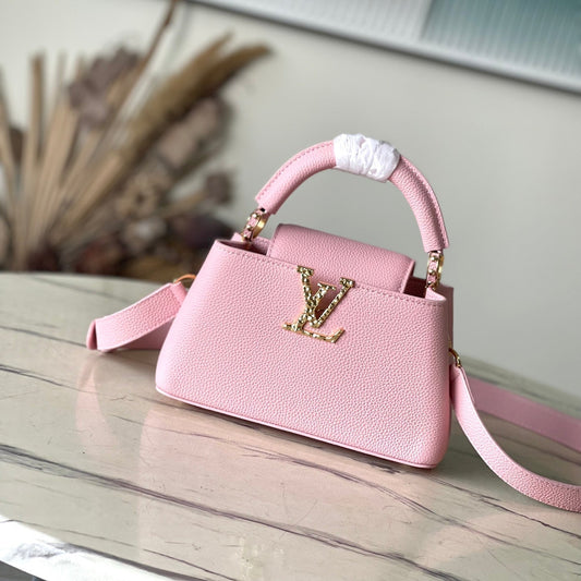 CAPUCINES EAST-WEST MINI 22 IN BLUSH PINK CALFSKIN GOLD HARDWARE