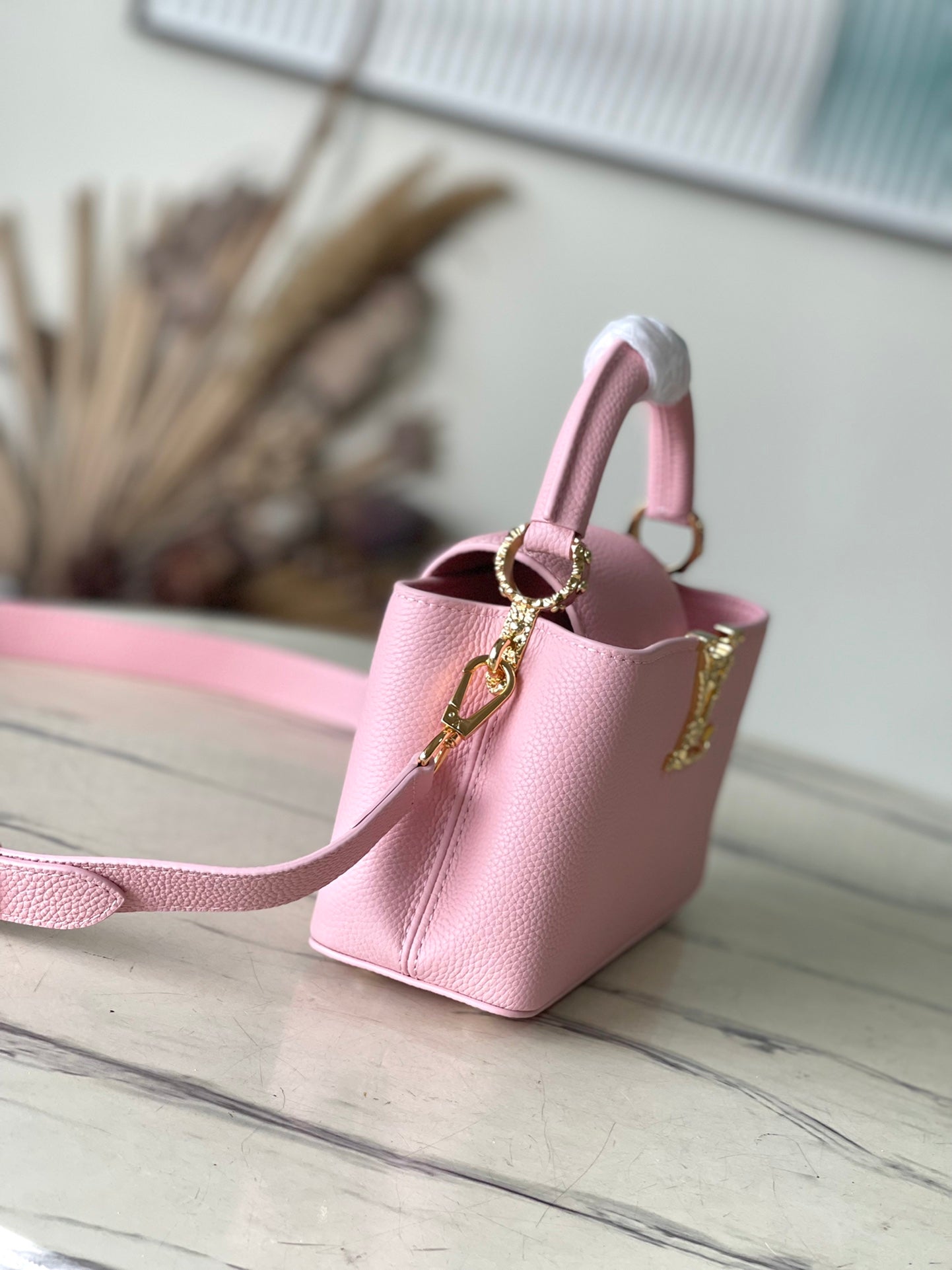 CAPUCINES EAST-WEST MINI 22 IN BLUSH PINK CALFSKIN GOLD HARDWARE