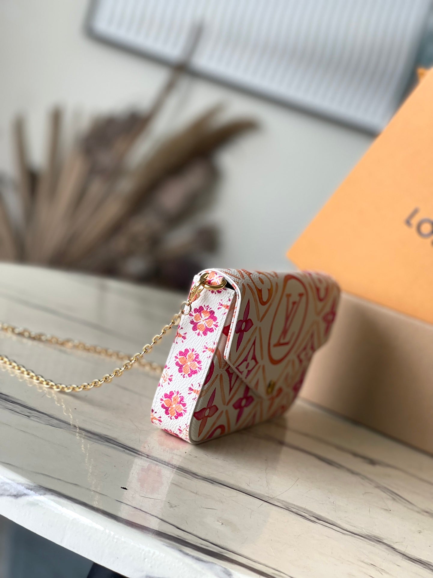 FÉLICIE POCHETTE 21 IN CORAL MONOGRAM TILES CANVAS