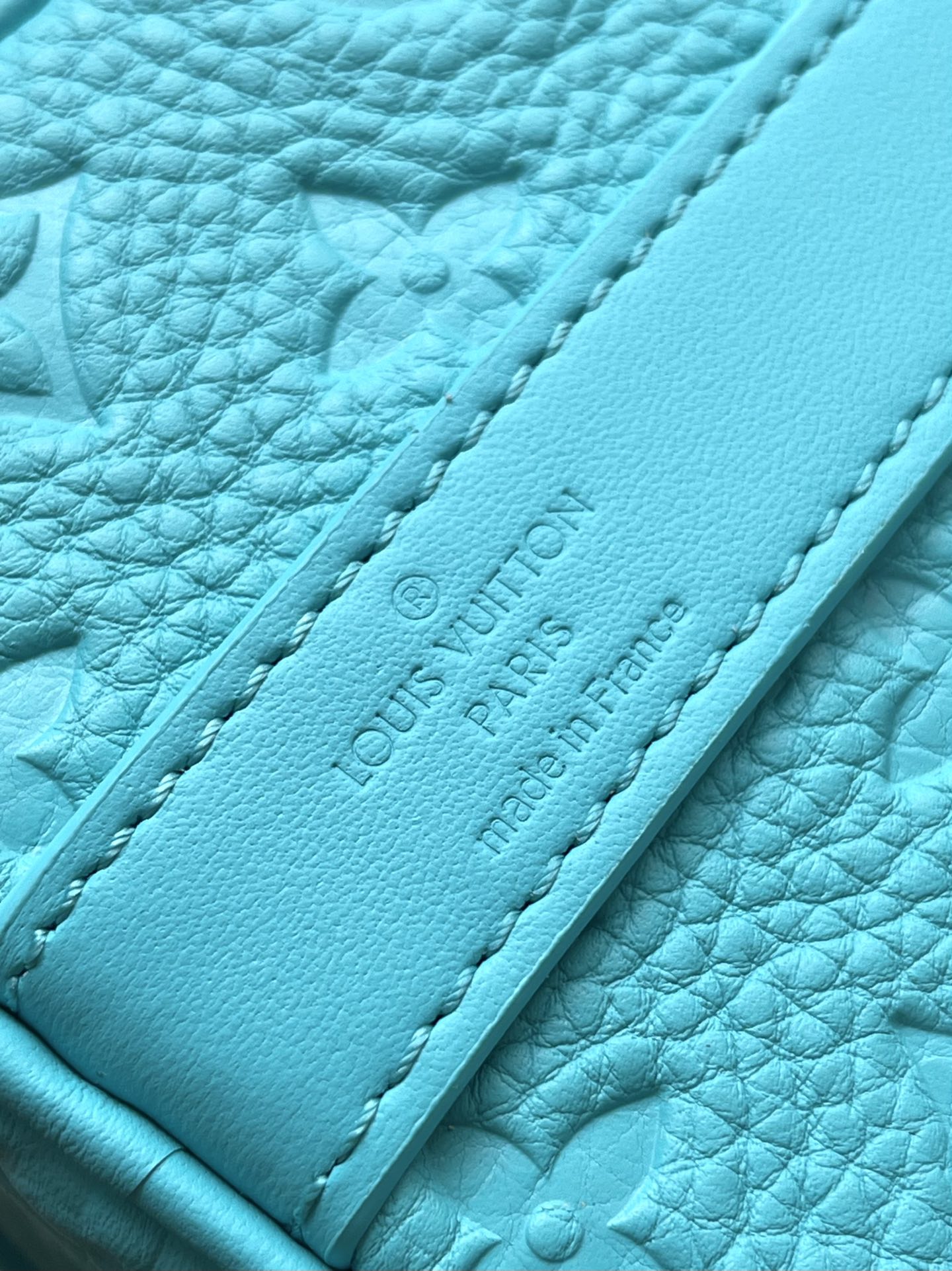 KEEPALL BANDOULIÈRE 25 IN TURQUOISE BLUE MONOGRAM EMBOSSED CALFSKIN