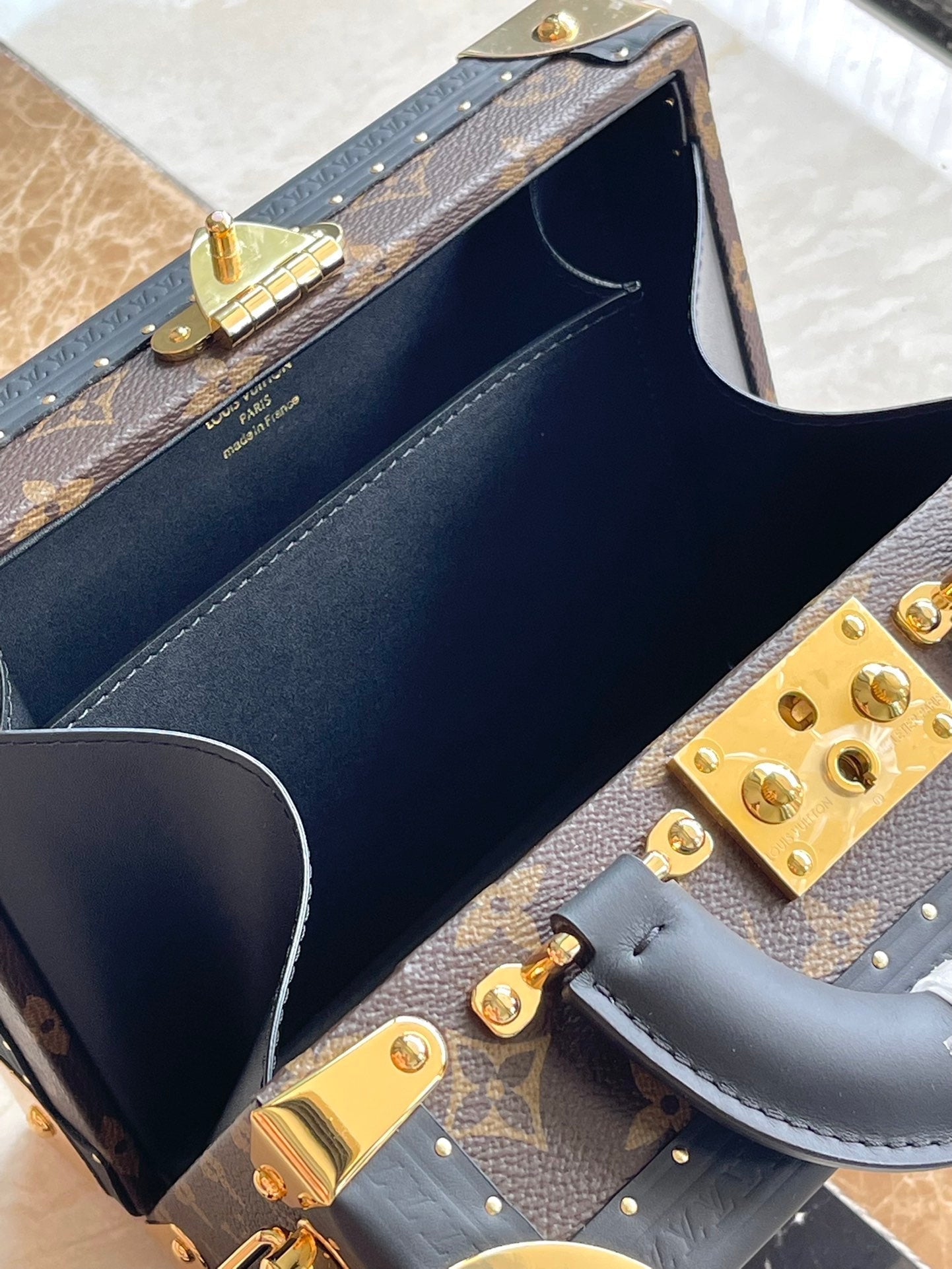 PETITE VALISE 22 IN BROWN MONOGRAM REVERSE CANVAS AND BLACK CALFSKIN TRIM GOLD HARDWARE