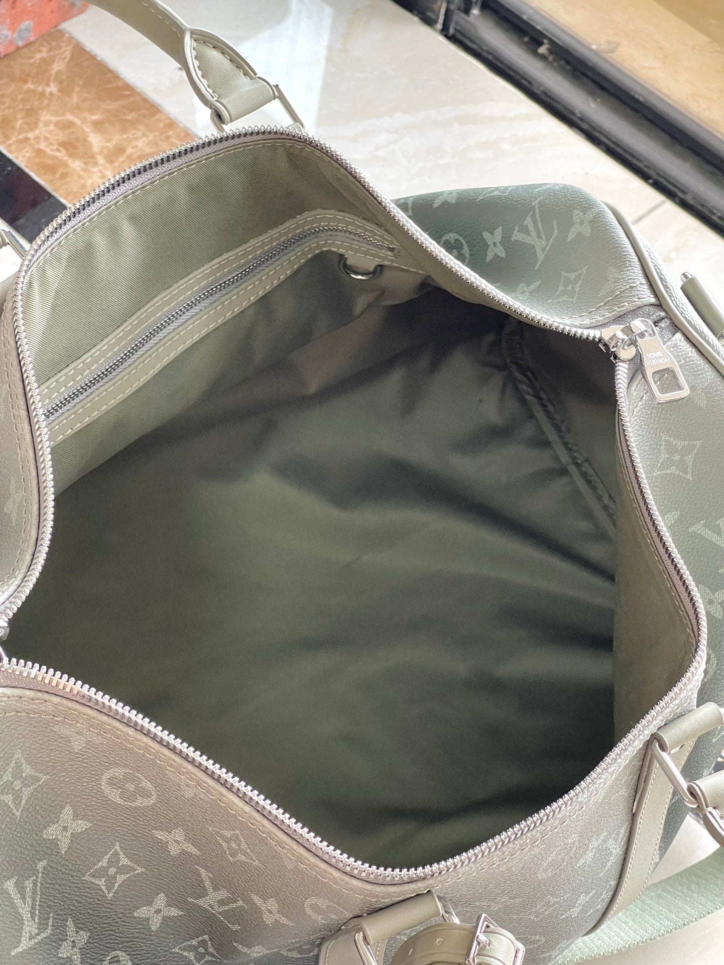 KEEPALL BANDOULIÈRE 45 IN GRAY MONOGRAM GRADIENT CANVAS