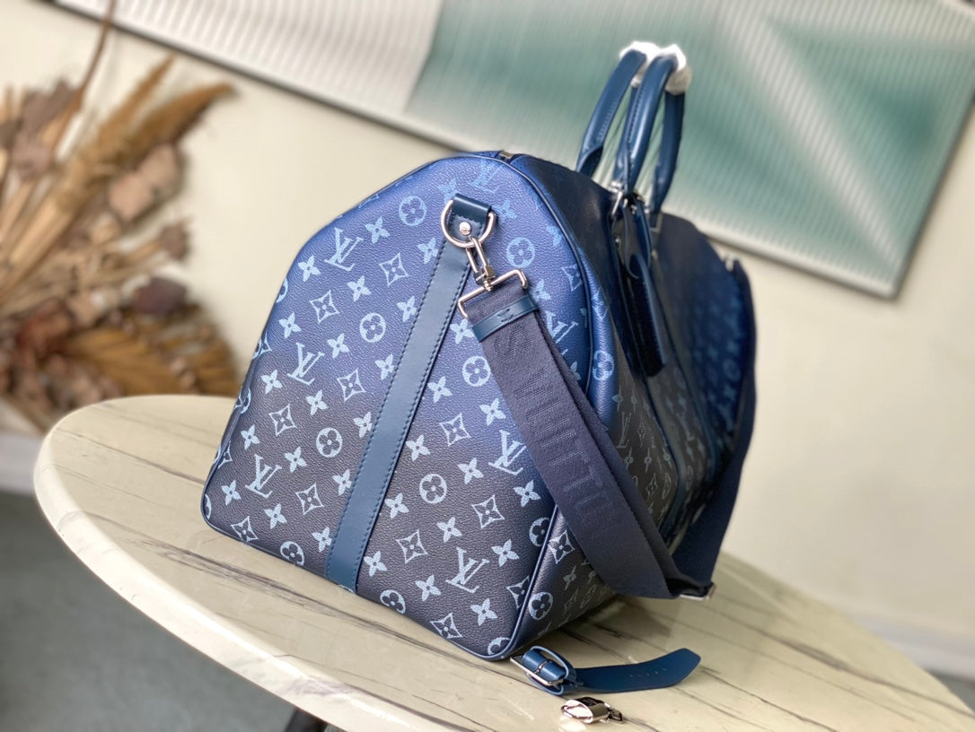 KEEPALL BANDOULIÈRE 55 IN NAVY GREEN MONOGRAM GRADIENT CANVAS