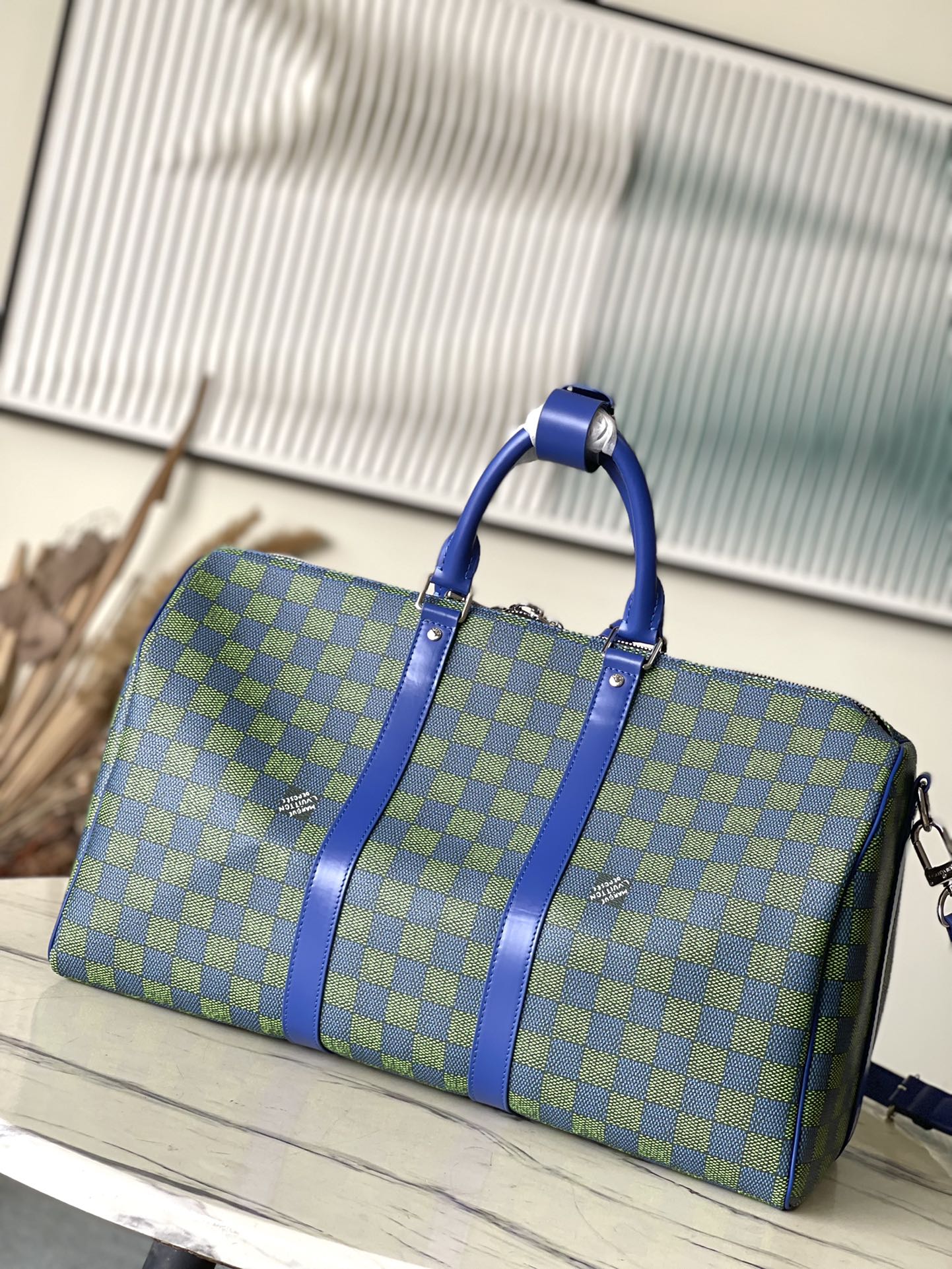 KEEPALL BANDOULIÈRE 45 IN BLUE GREEN DAMIER HERITAGE COATED CANVAS