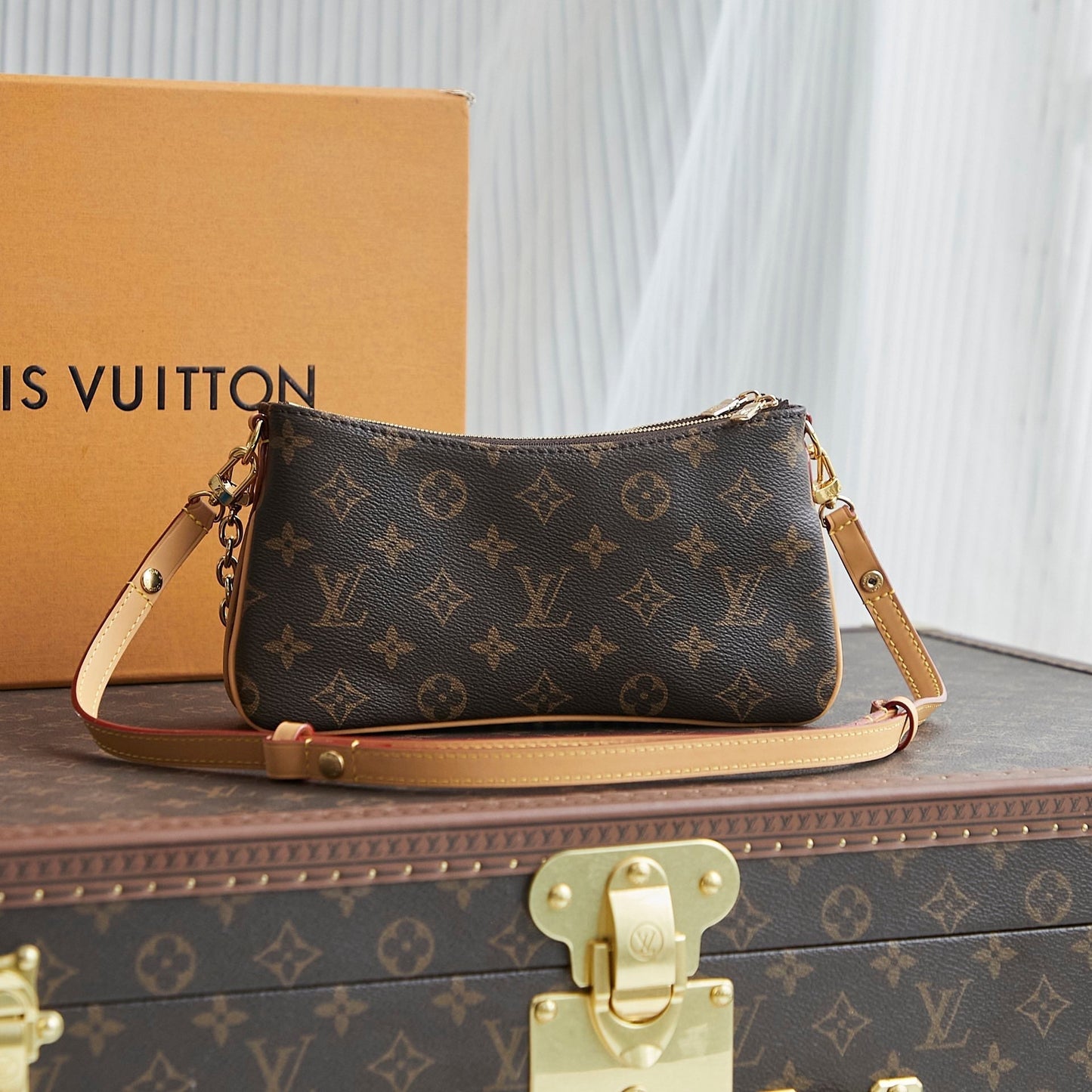 LIV POCHETTE 24 IN BROWN MONOGRAM CANVAS GOLD HARDWARE