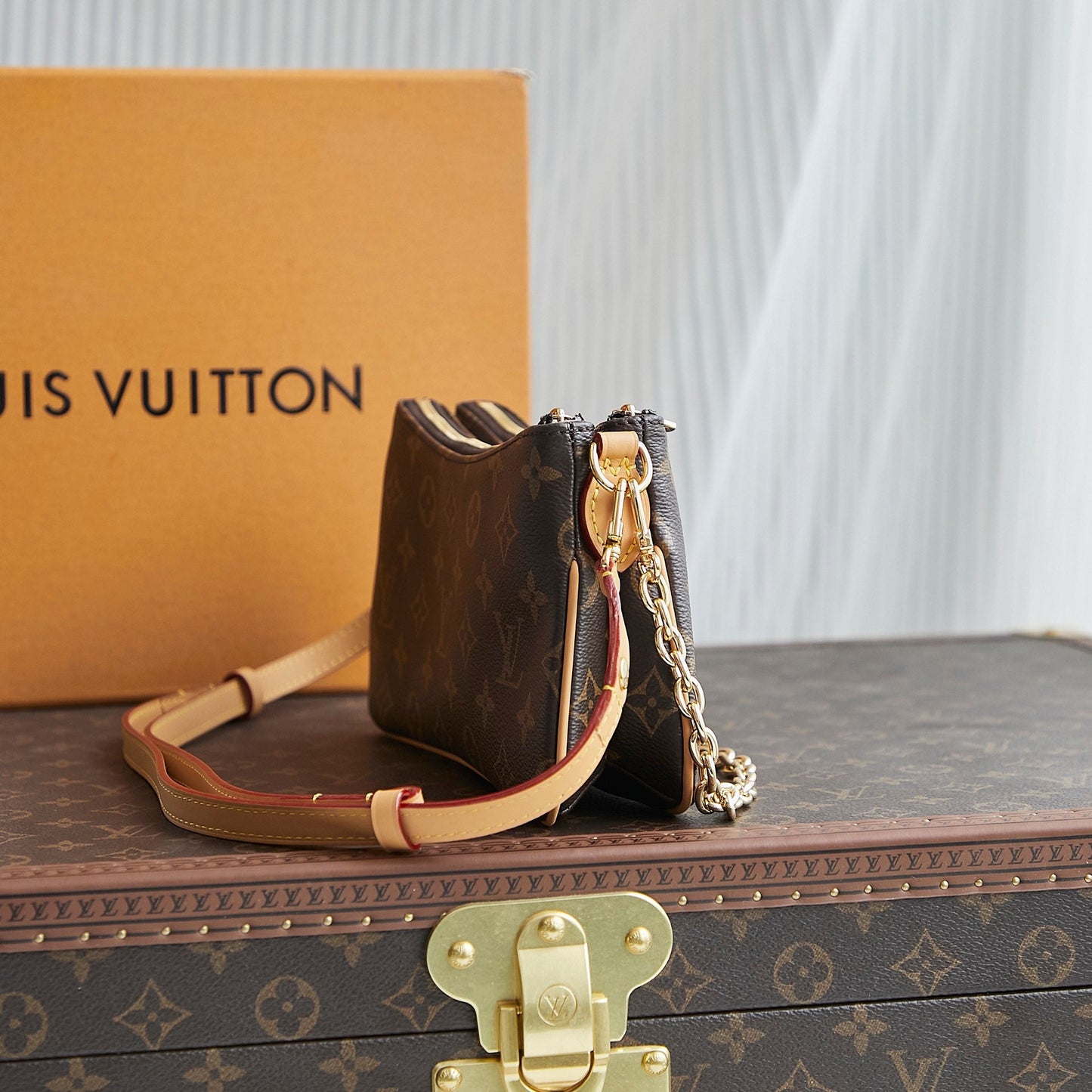 LIV POCHETTE 24 IN BROWN MONOGRAM CANVAS GOLD HARDWARE