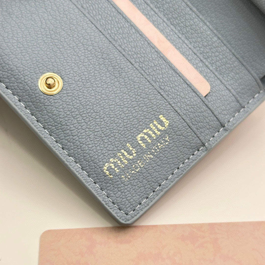 SMALL WALLET 11 IN BLUE PASTEL CALFSKIN