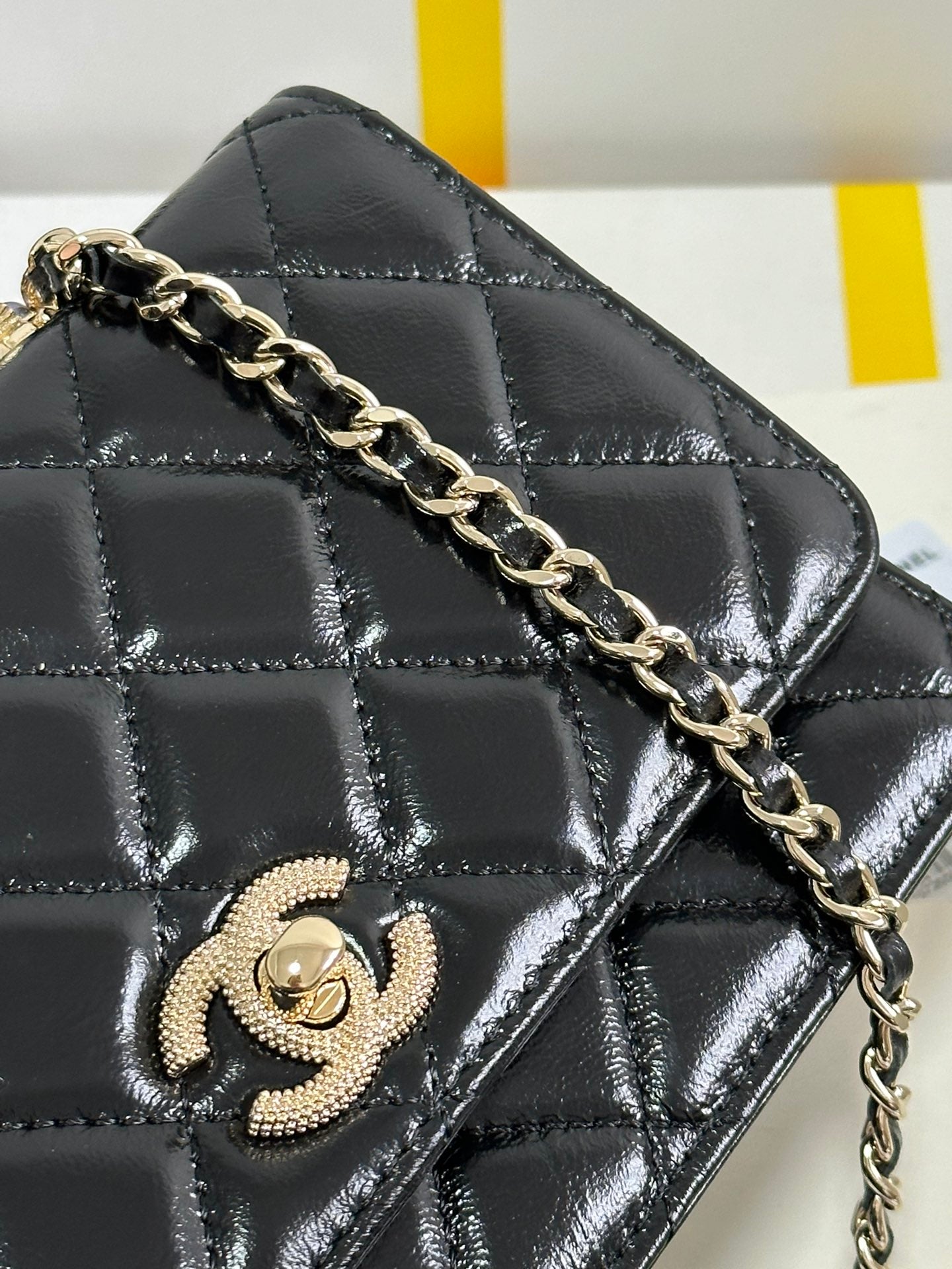 PEARL HANDLE FLAP BAG 18 IN BLACK SHINY LAMBSKIN