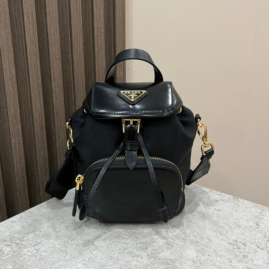 MINI BACKPACK 18 IN BLACK RE-NYLON AND GLOSSY CALFSKIN GOLD HARDWARE