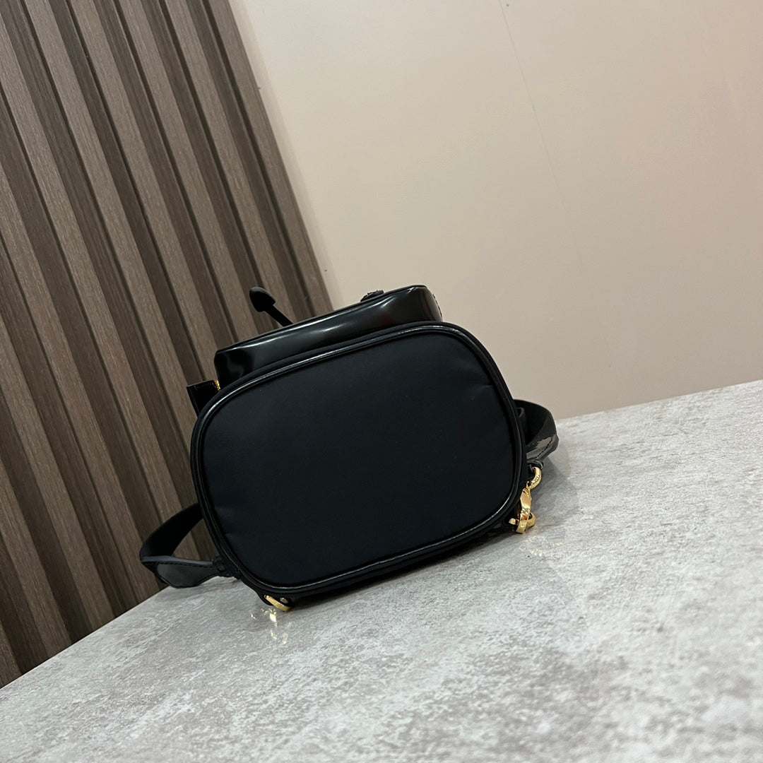 MINI BACKPACK 18 IN BLACK RE-NYLON AND GLOSSY CALFSKIN GOLD HARDWARE