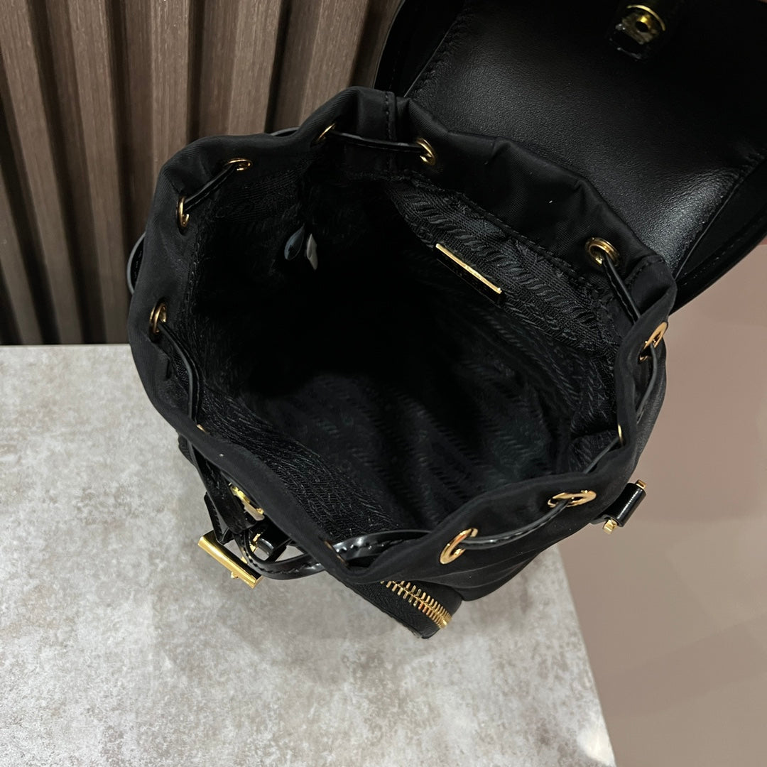 MINI BACKPACK 18 IN BLACK RE-NYLON AND GLOSSY CALFSKIN GOLD HARDWARE