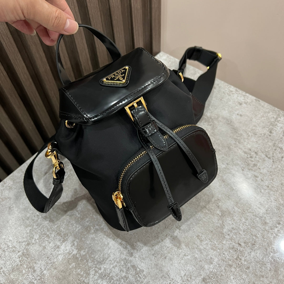 MINI BACKPACK 18 IN BLACK RE-NYLON AND GLOSSY CALFSKIN GOLD HARDWARE