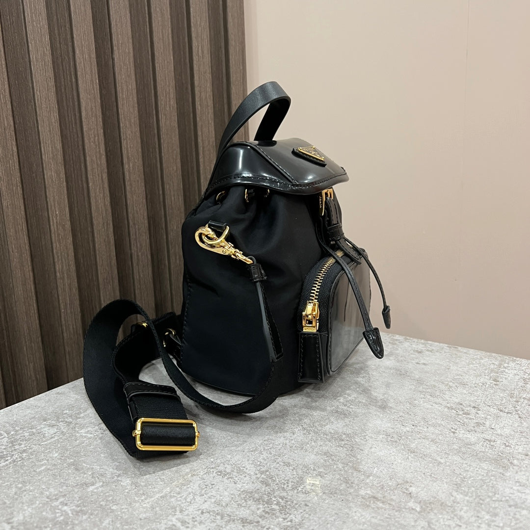 MINI BACKPACK 18 IN BLACK RE-NYLON AND GLOSSY CALFSKIN GOLD HARDWARE