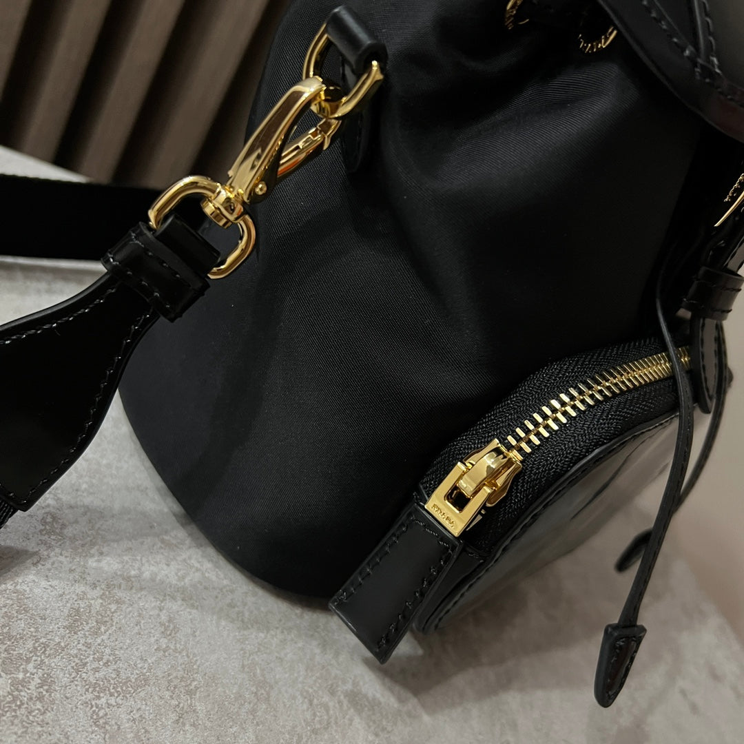 MINI BACKPACK 18 IN BLACK RE-NYLON AND GLOSSY CALFSKIN GOLD HARDWARE