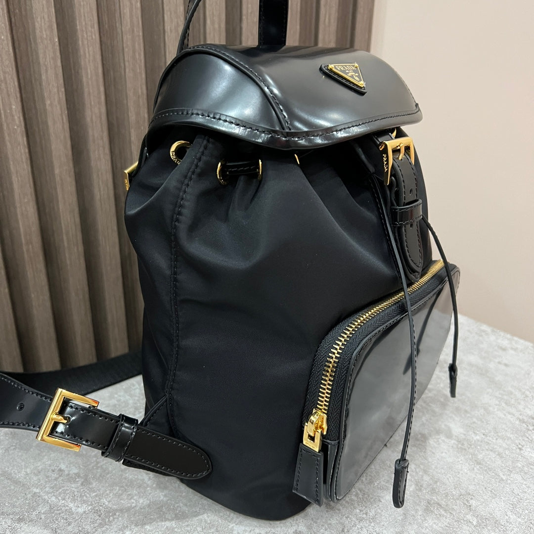 BACKPACK 25 IN BLACK RE-NYLON AND GLOSSY CALFSKIN GOLD HARDWARE